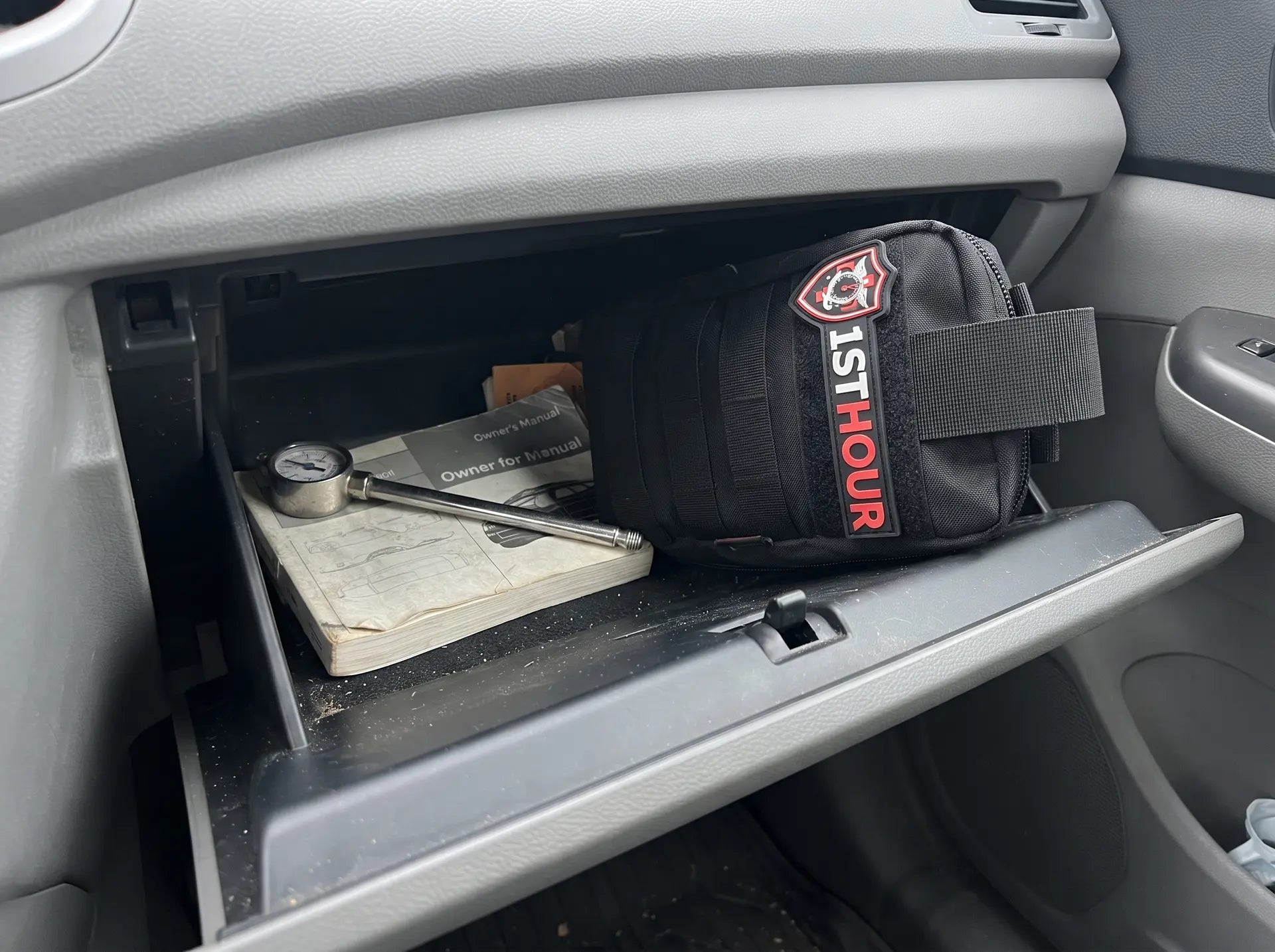 1stHour kit stored in a vehicle glovebox